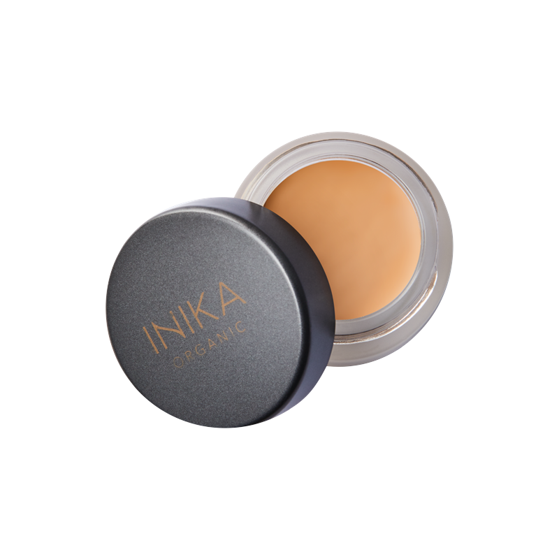 INIKA Organic Full Coverage Concealer Tawny is een natuurlijke romige veganistische concealer die oneffenheden, donkere kringen en vlekken camoufleert. Samengesteld met huidverzorgende botanische ingrediënten om de huid te hydrateren en te voeden zodat oneffenheden worden gecamoufleerd zonder de poriën te verstoppen.